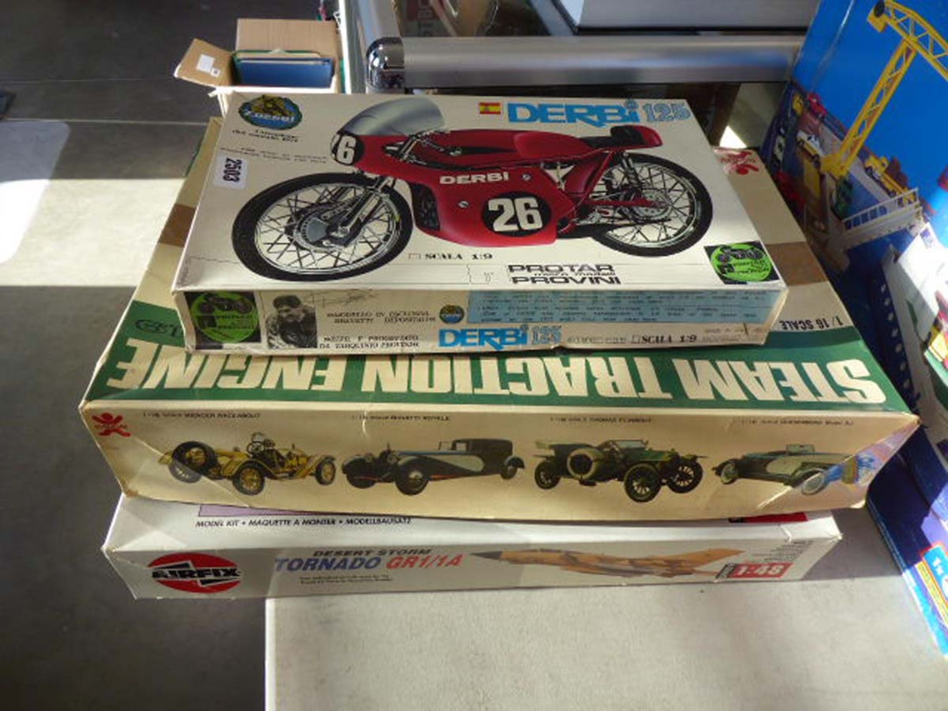 Derby model of a motorbike, steam engine and a jet aircraft