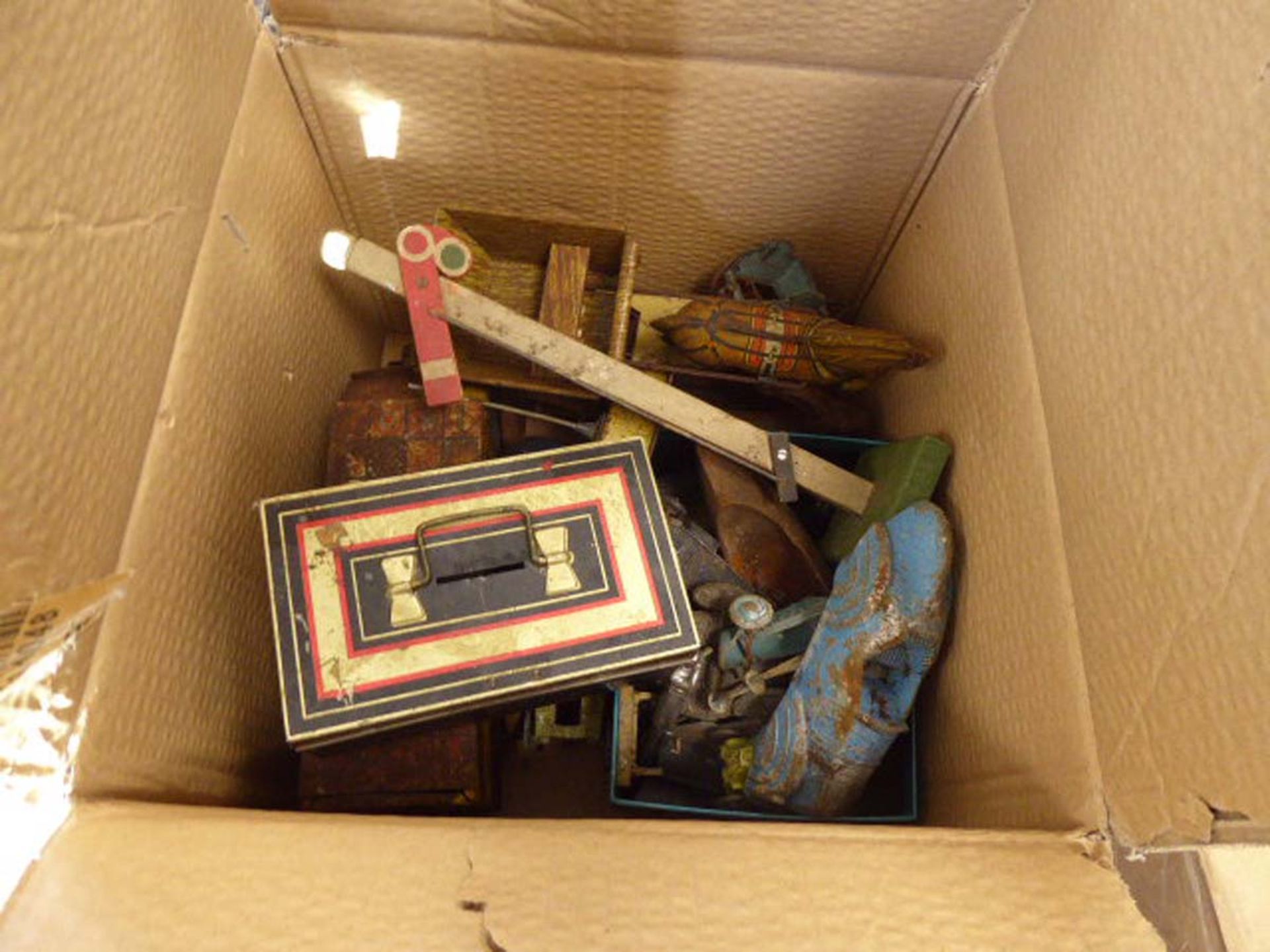 Box of tin plate toys