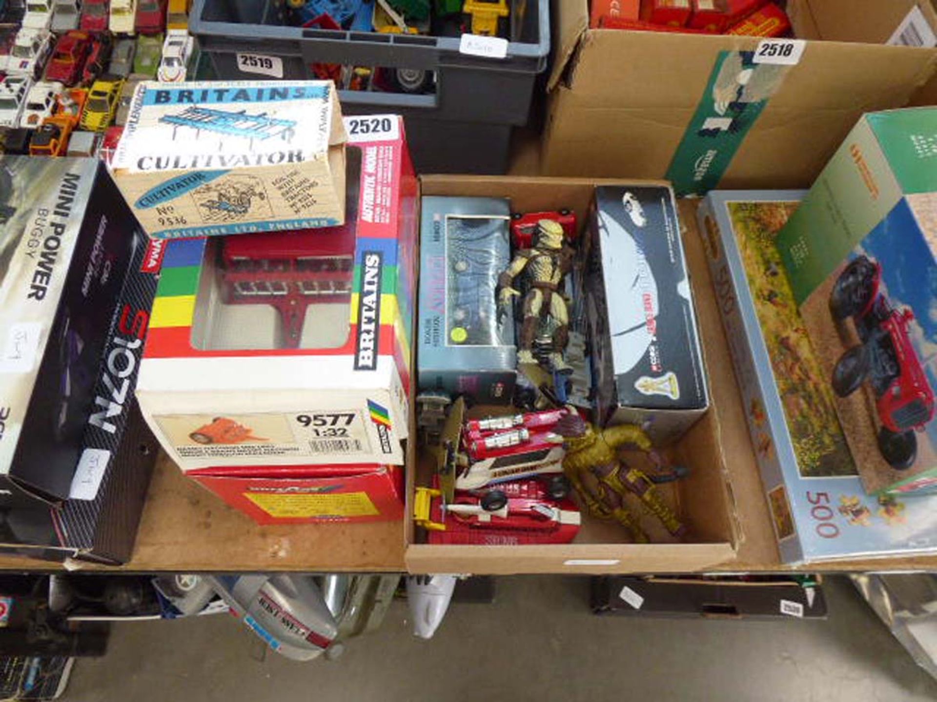 Box of assorted Corgi car toys, model figurines, farm implements etc.
