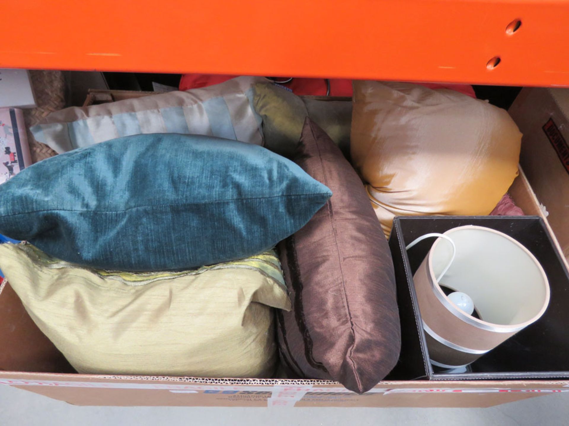 Large box of various sofa cushions, lamps etc