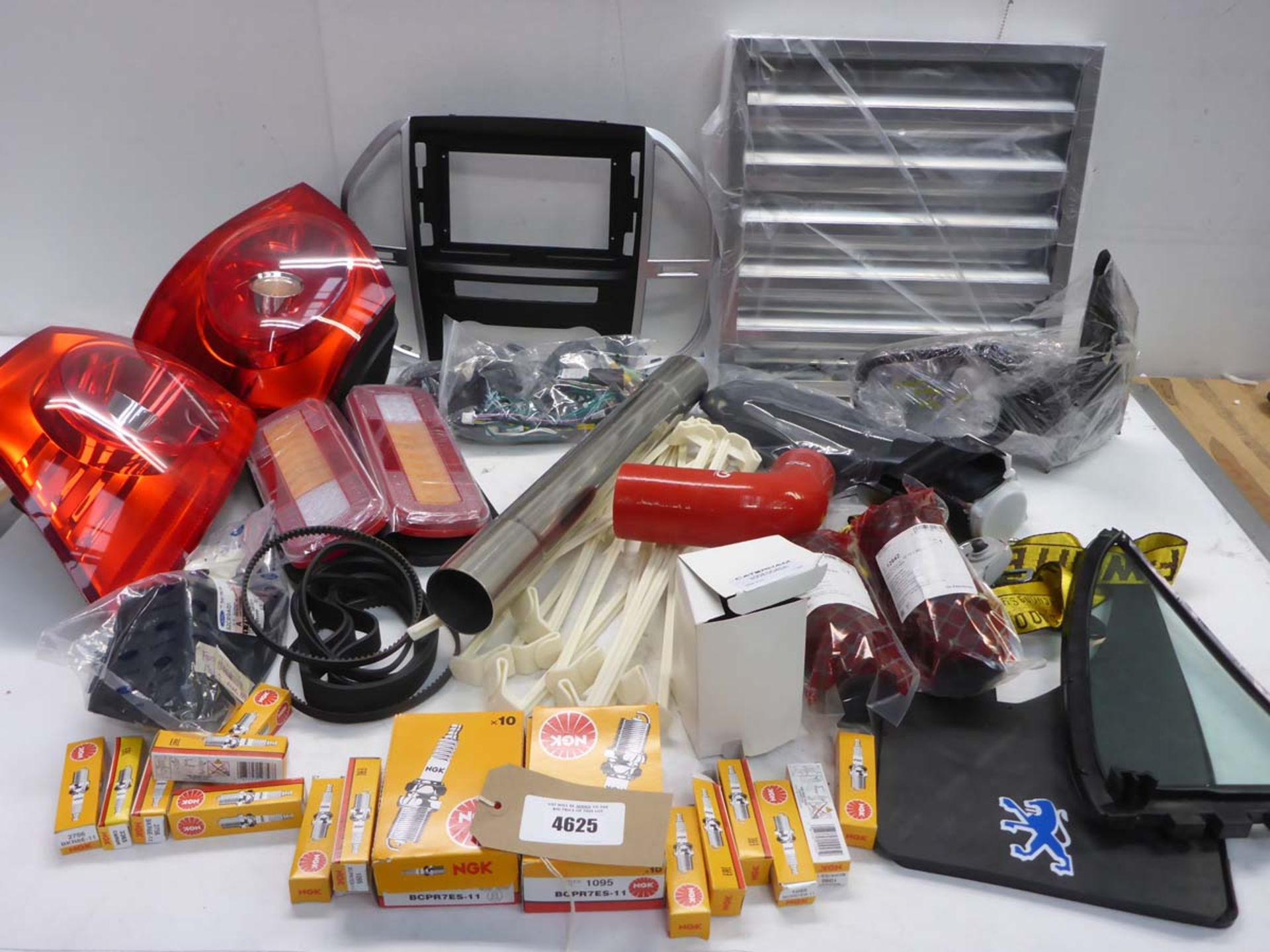 Car parts including grease filter, dash insert & wiring, steering rack boots, wind mirrors, spark