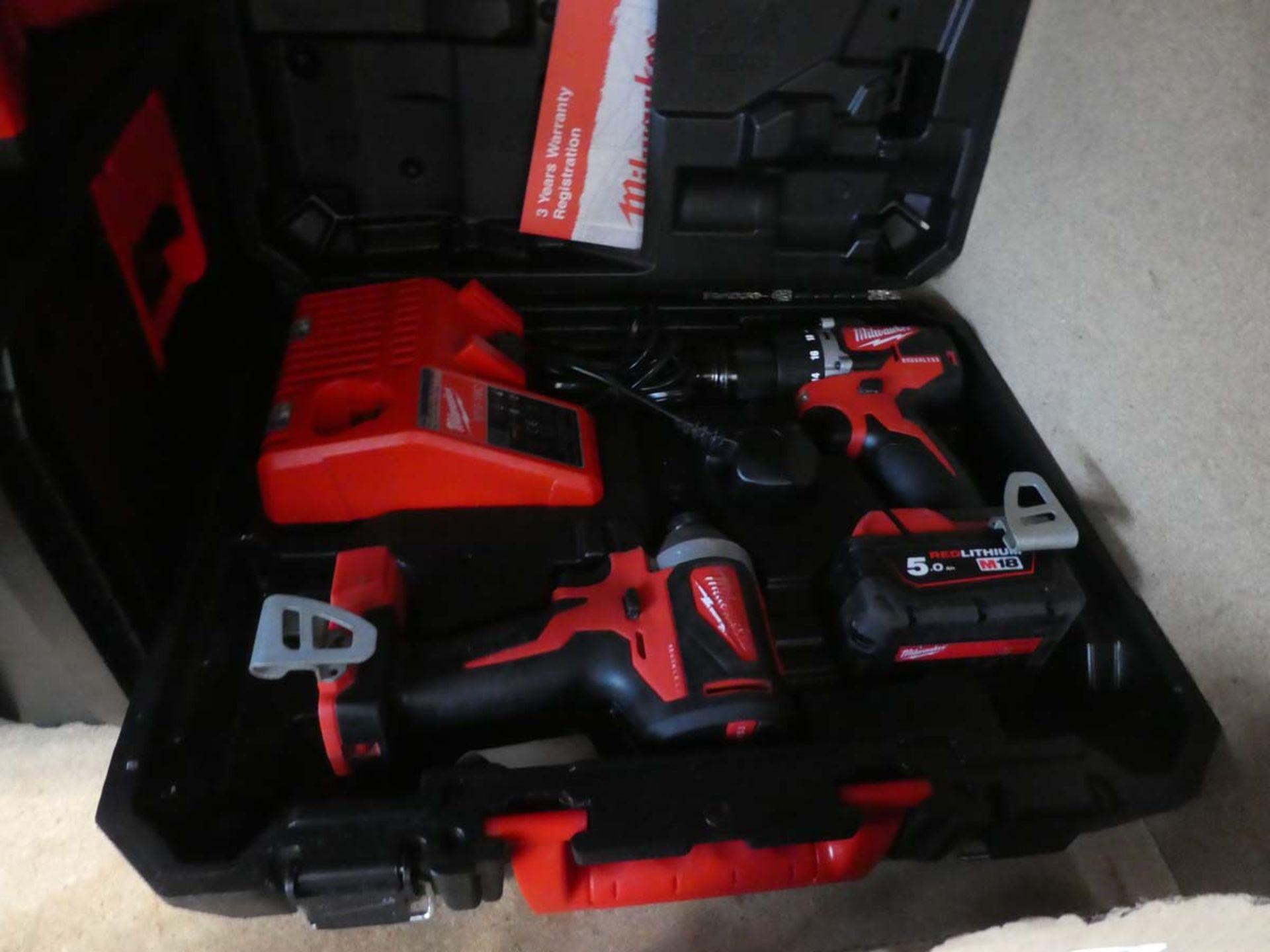 Milwaukee drill and impact set with 1 battery and charger