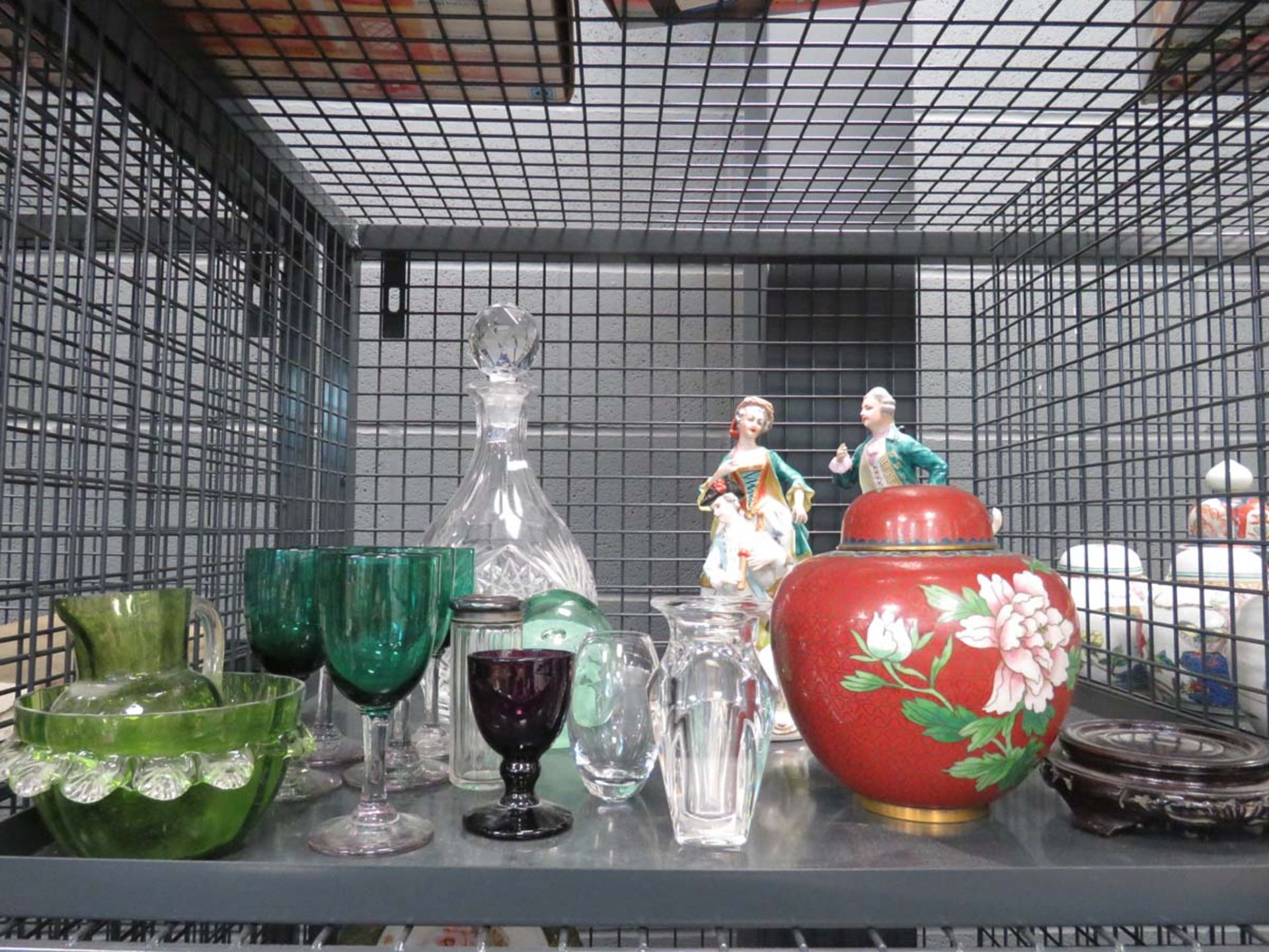 Cage containing modern Cloissone ginger jar, ornamental figures, decanter and coloured sherry