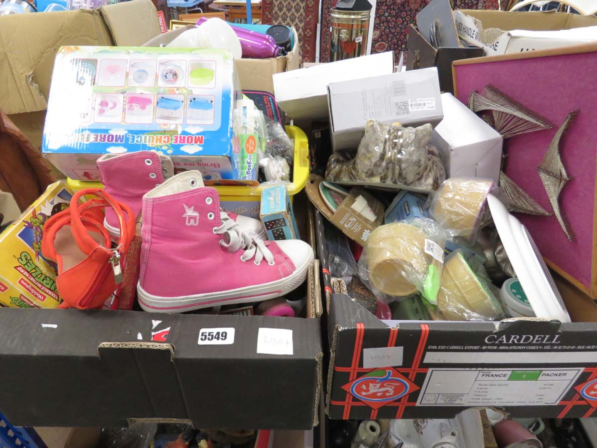 2 boxes containing roller skates, shoes, childrens toys, Winstanley cat, fishing tackle, crockery,