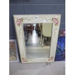 Rectangular bevelled mirror in floral patterned frame