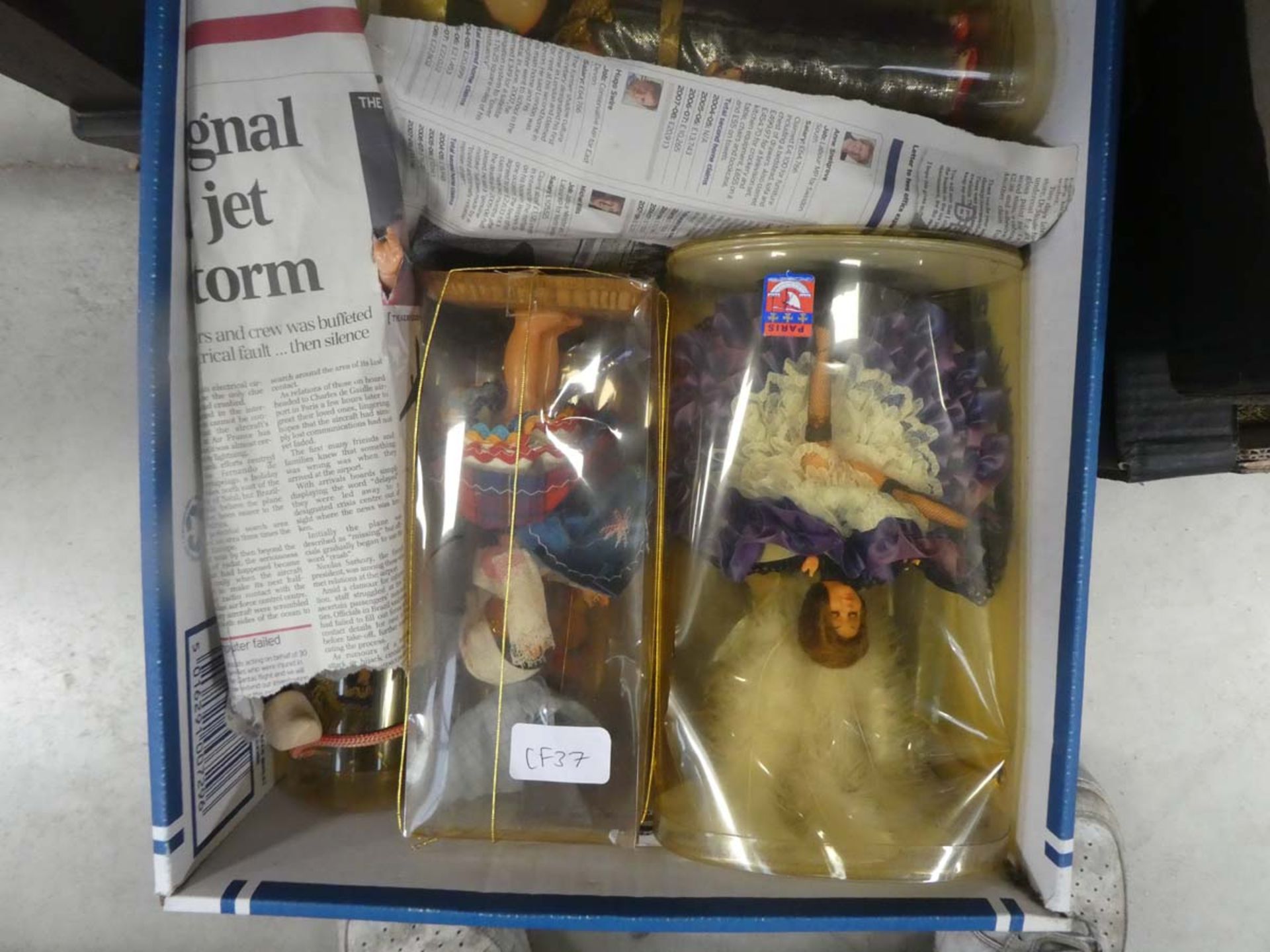 Box containing National dolls