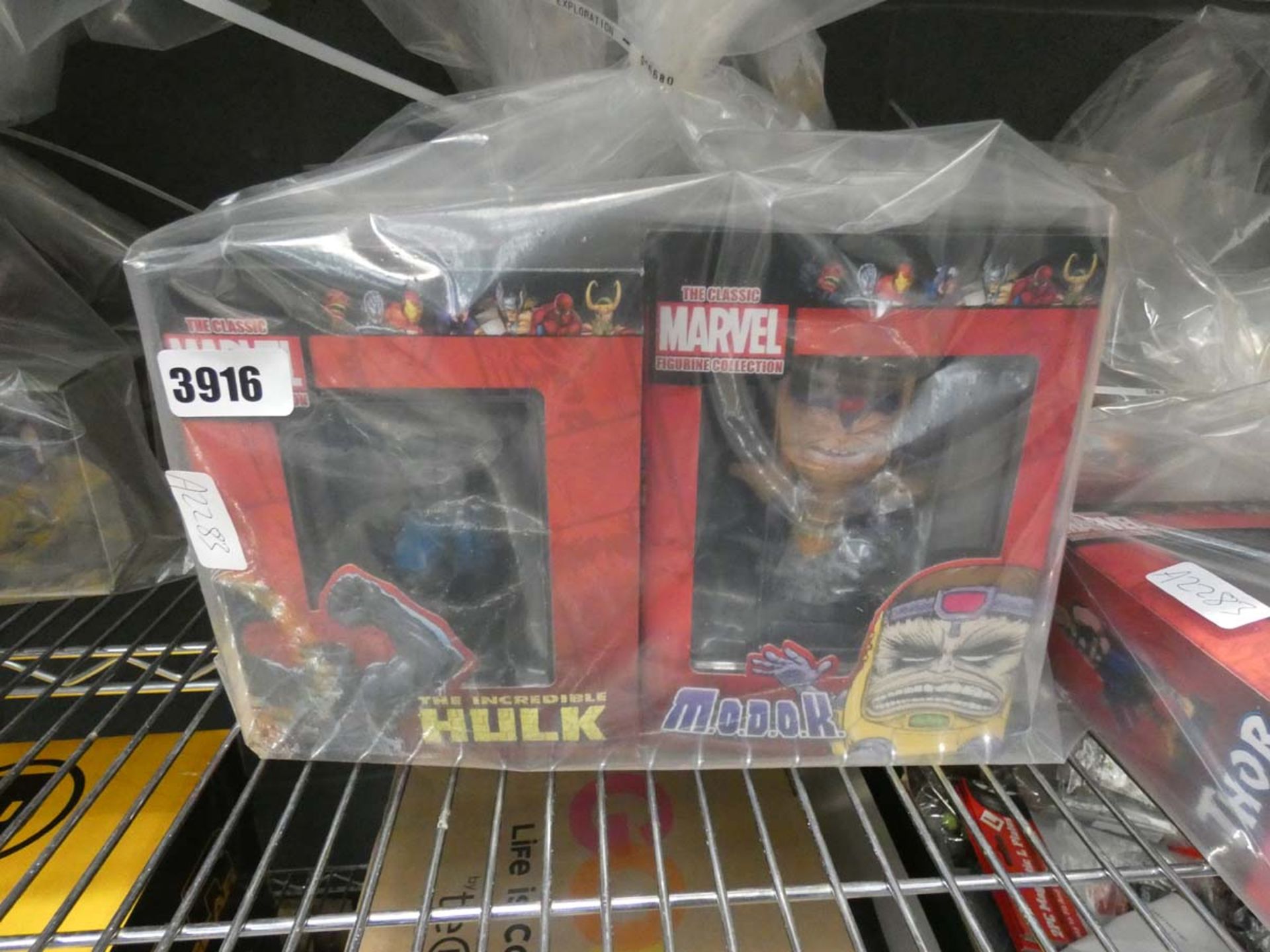 Bag containing the Classic Marvel Incredible Hulk figurine plus the Classic Marvel Modok figurine