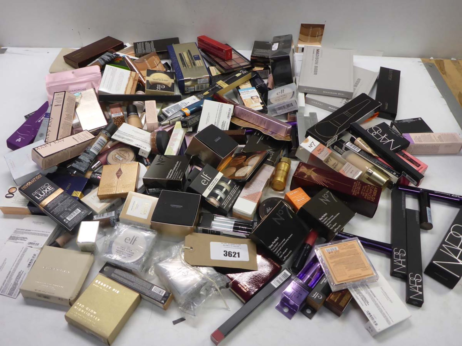 Large assortment of branded cosmetics including Burberry, Charlotte Tilbury, NARS, MAC, Tropic,