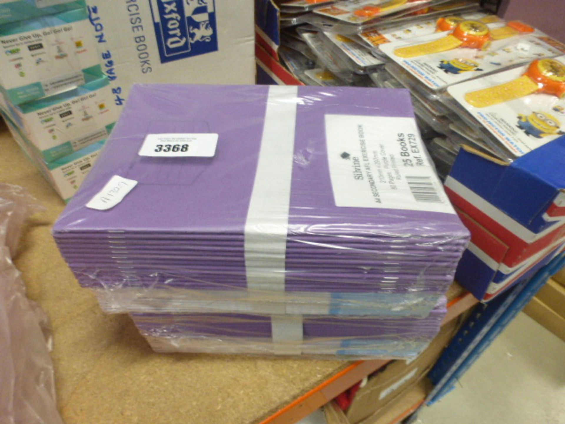 Two packs of approx 50 exercise books