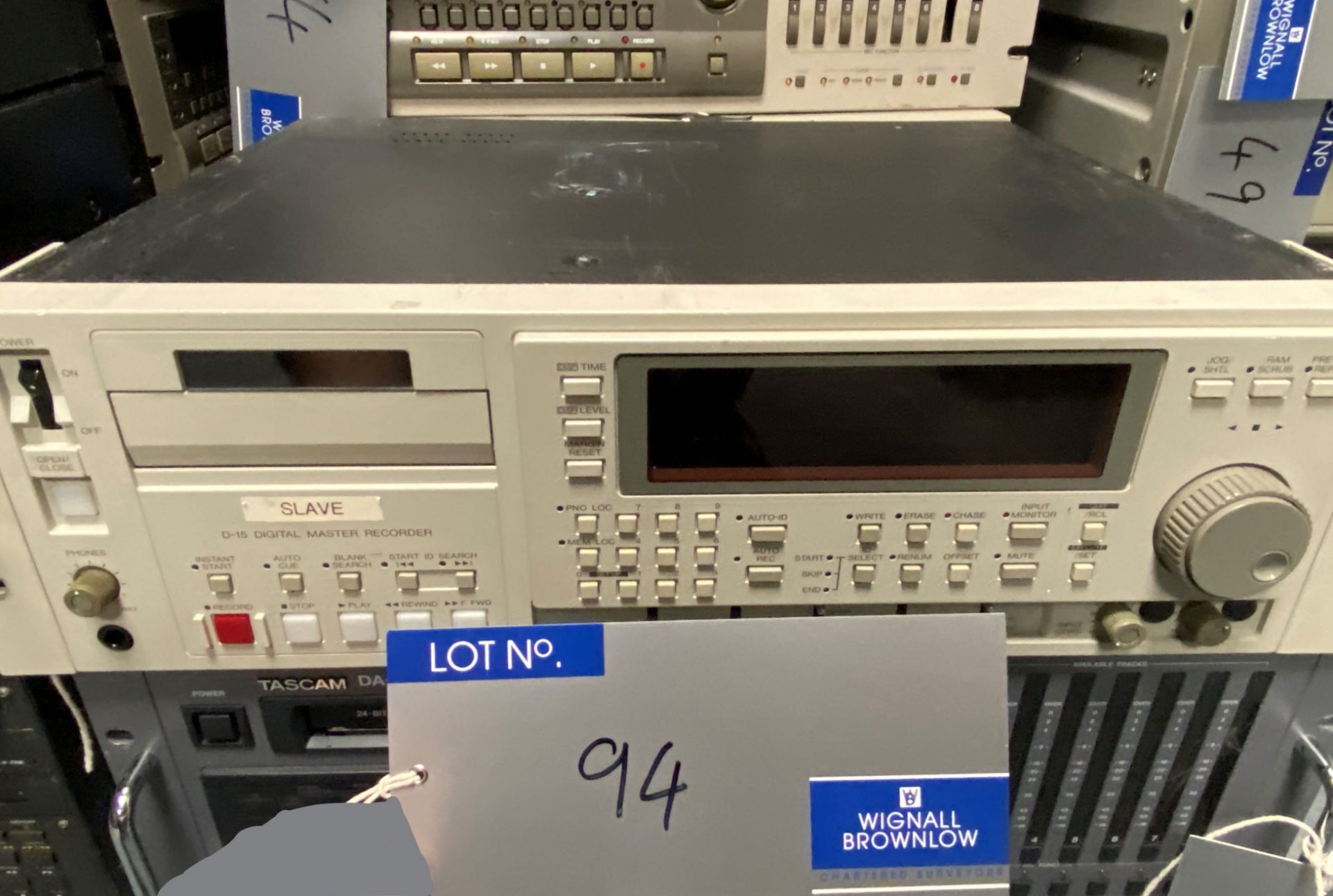 A Fostex D-15 Digital Master Recorder (tape plays).