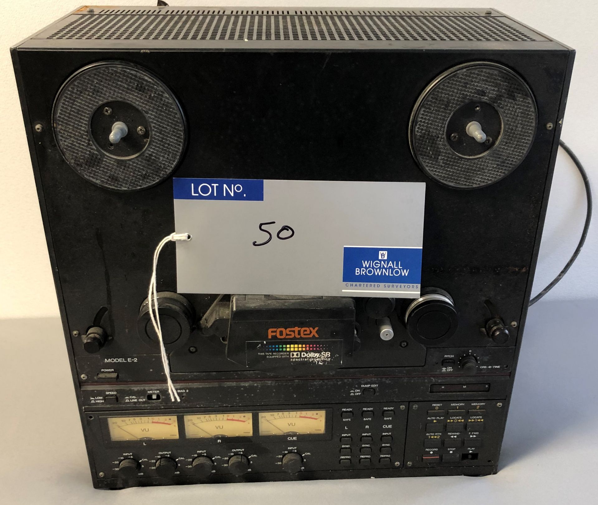 A Fostex E-2 Reel to Reel Tape Recorder (powers up).