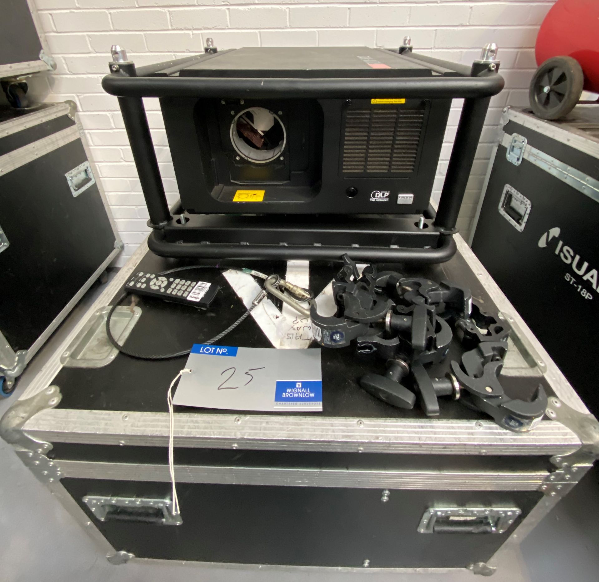 A Barco RLM W12 DLP Projector with Flying/Stacking Frame, Remote Control and mobile flight case (