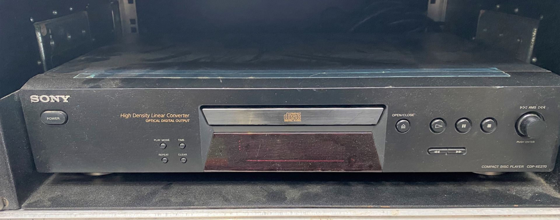 A Sony XE270 Compact Disc Player with flight case (not used for over 12 months-working when last