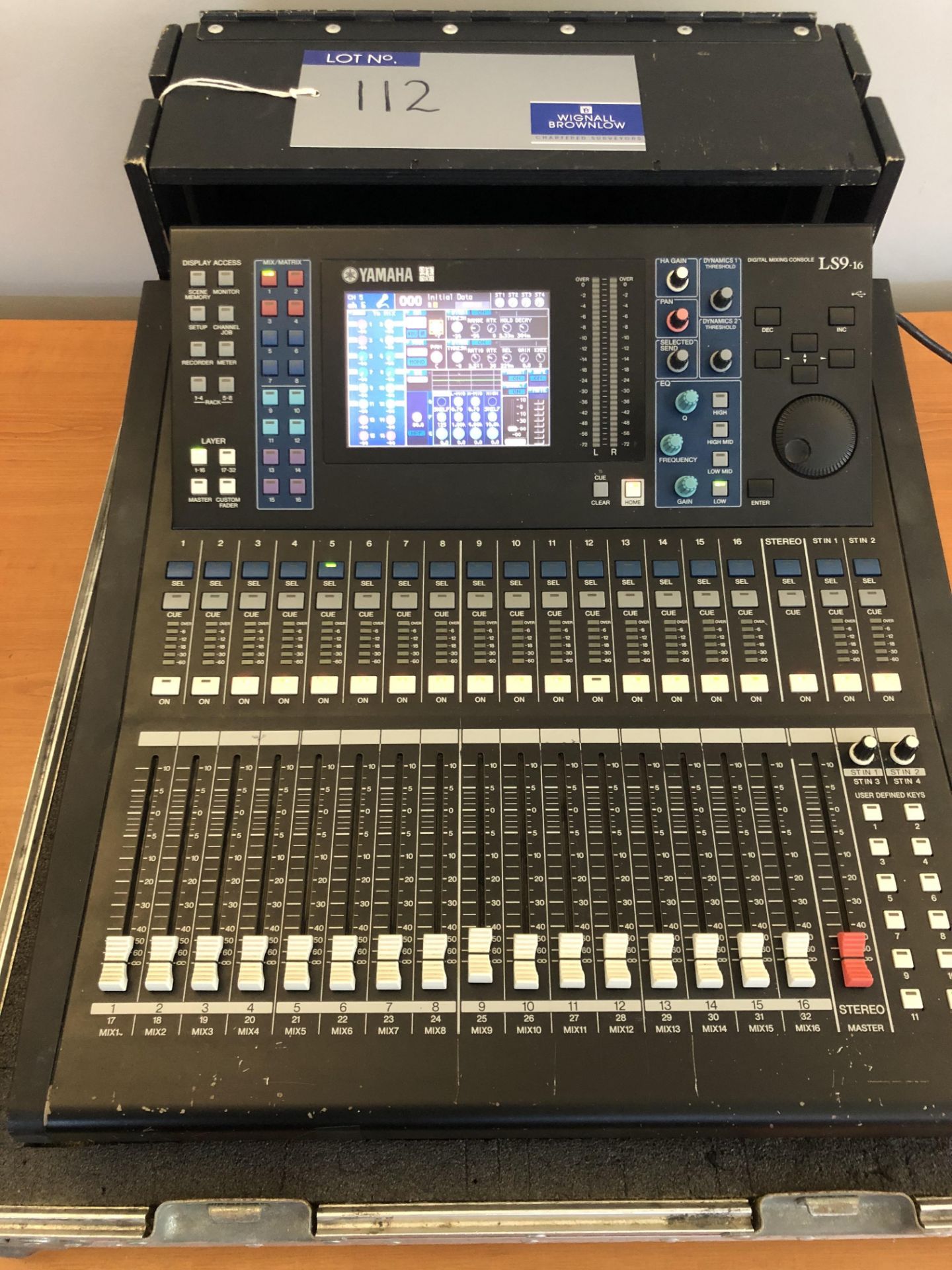 A Yamaha LS9-16 Digital 16 channel Mixing Console with flight case (small white mark on screen