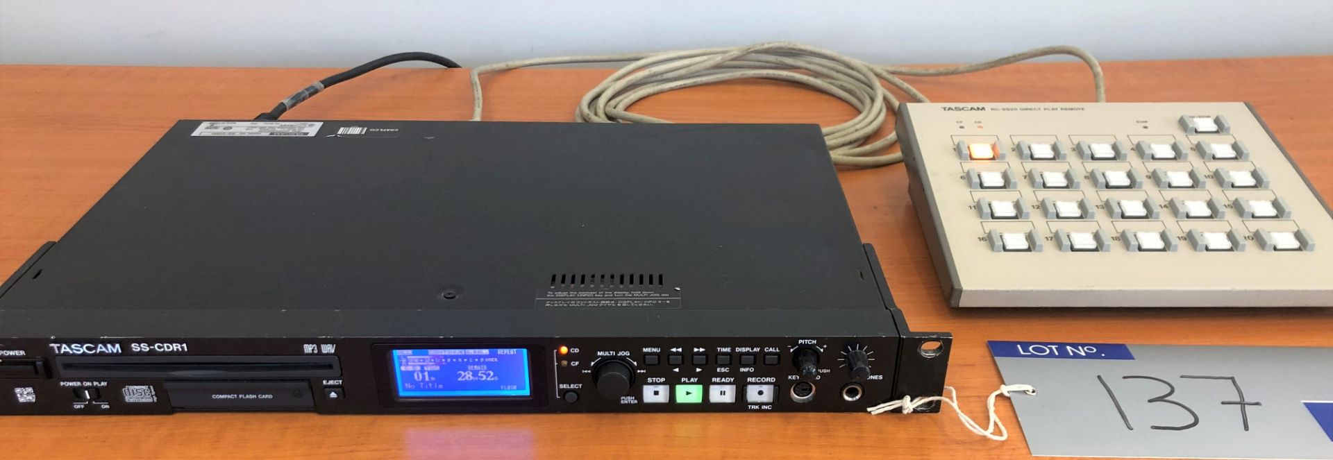 A Tascam SS-CDR1 Solid State CD Recorder with Card Player/Recorder and Tascam RC-SS20 Remote