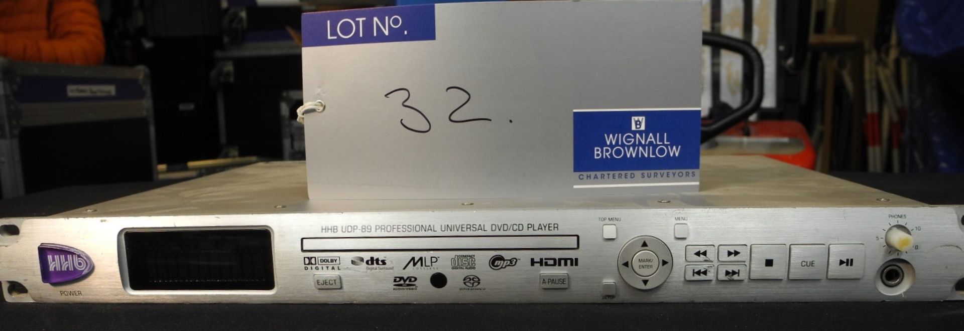 A HHB UDP-89 Professional Universal DVD/CD Player with remote control and IEC-13A power cable,