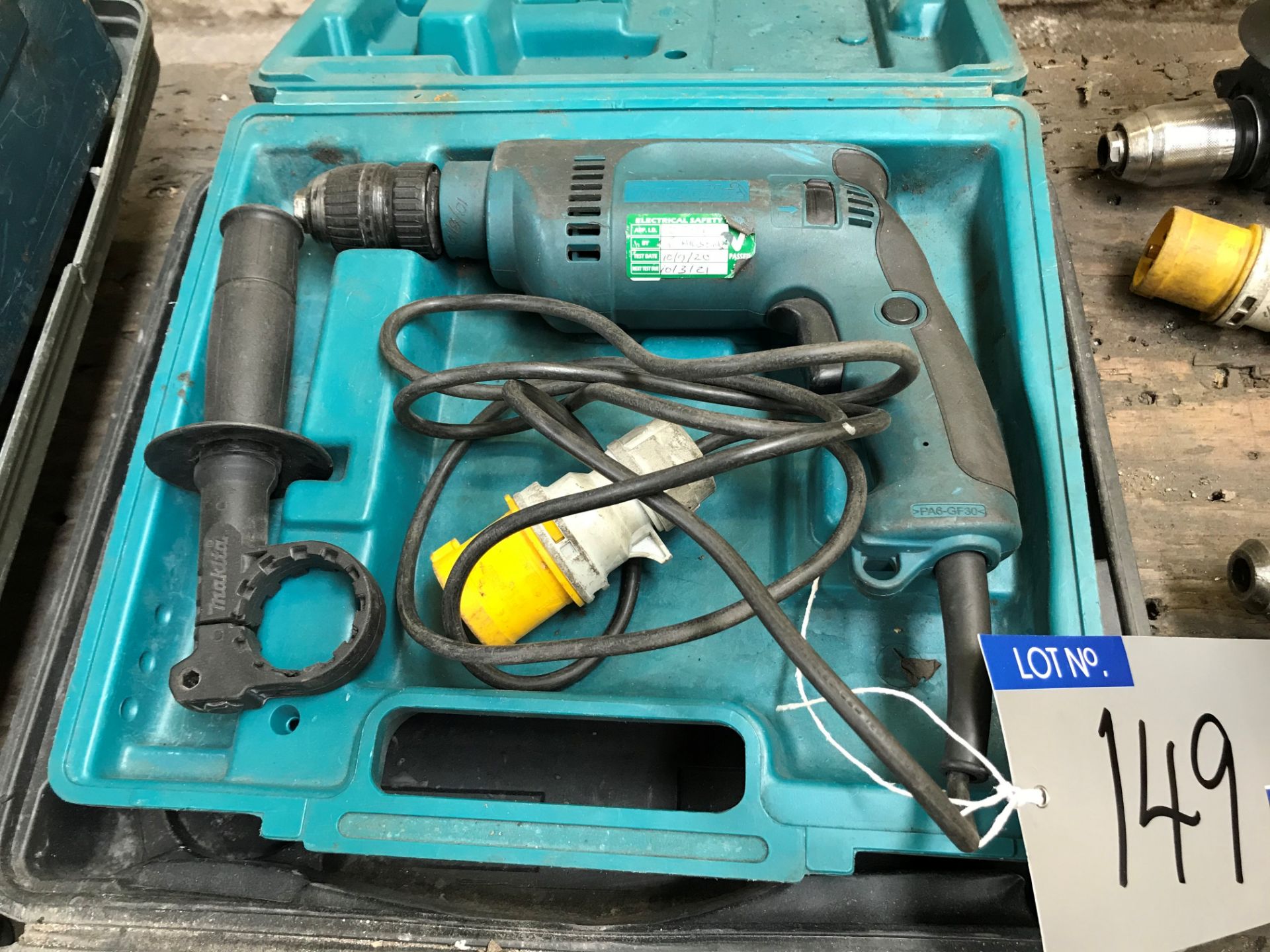 A Makita HP1621 Drill with case, 110v.