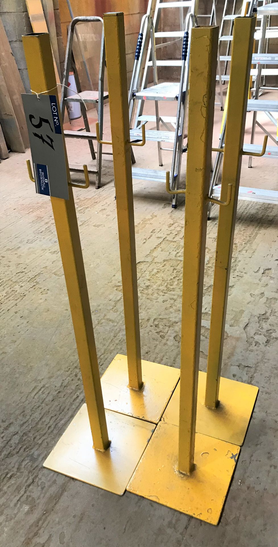 4 Steel Stands on square bases, 1200mm h.