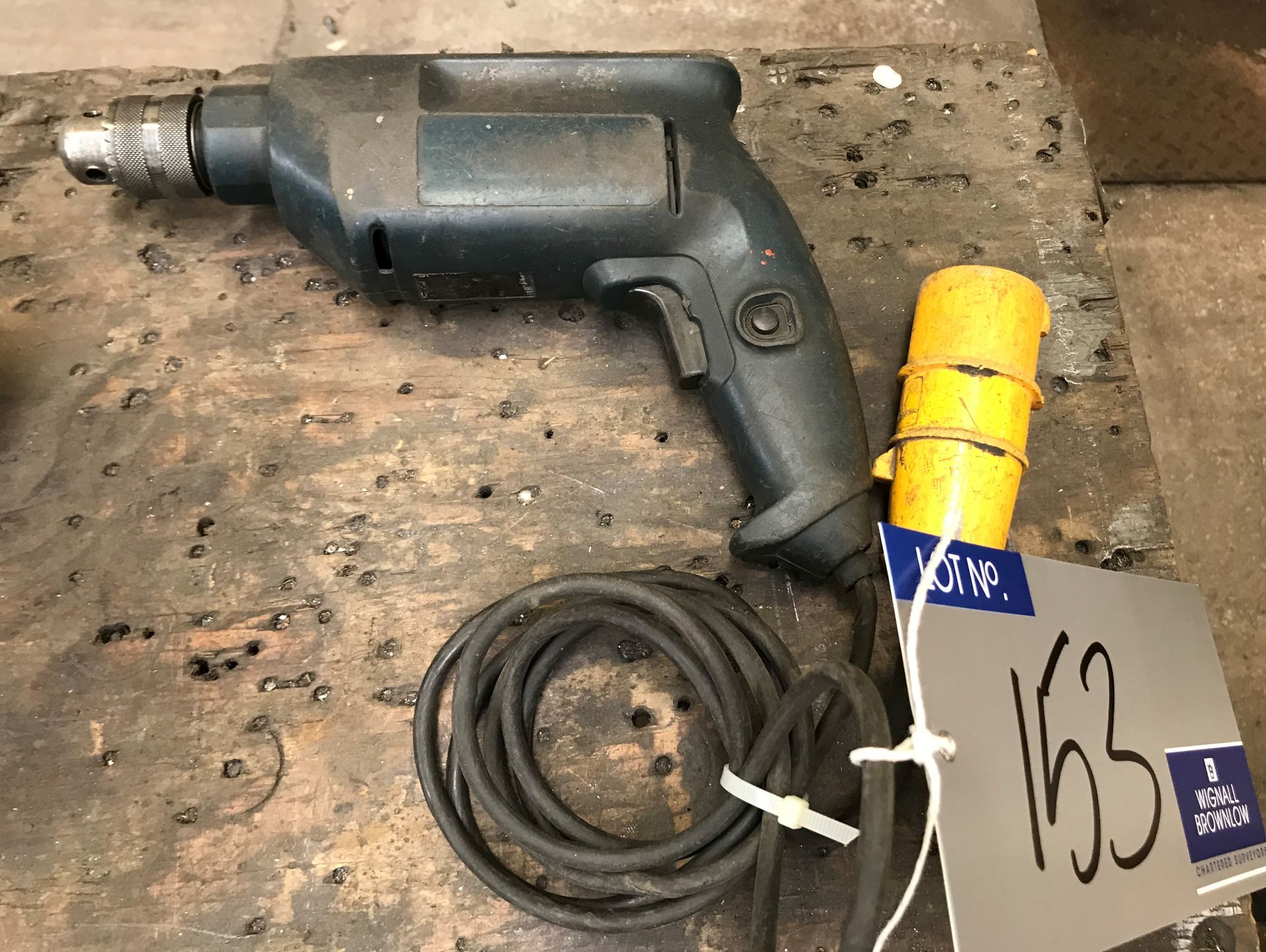 A Bosch 110v Electric Drill.