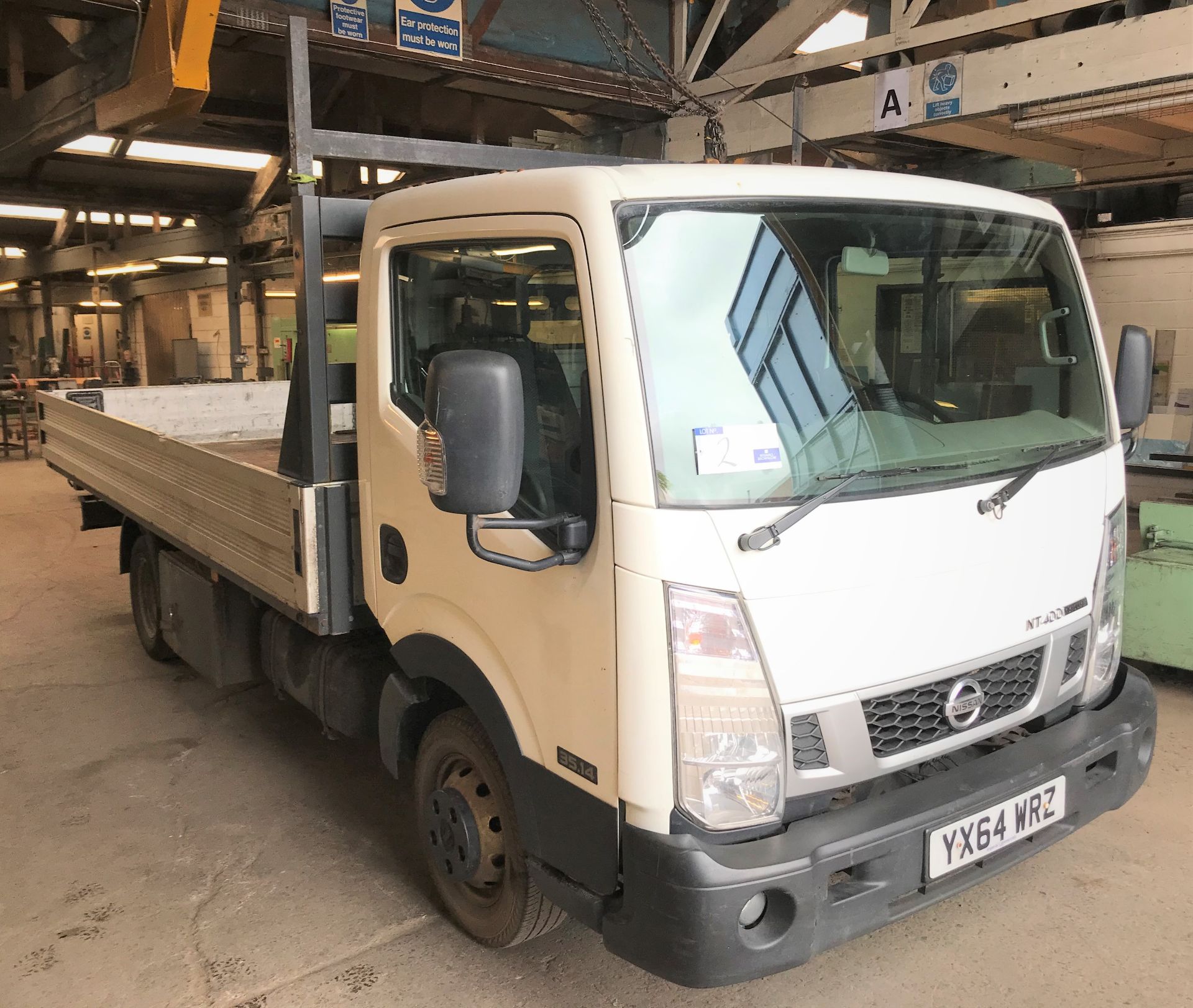 A Nissan NT400 Cabstar 35.14 LWB DCI Dropside Truck Reg. No.YX64WRZ, first registered 30/9/2014,