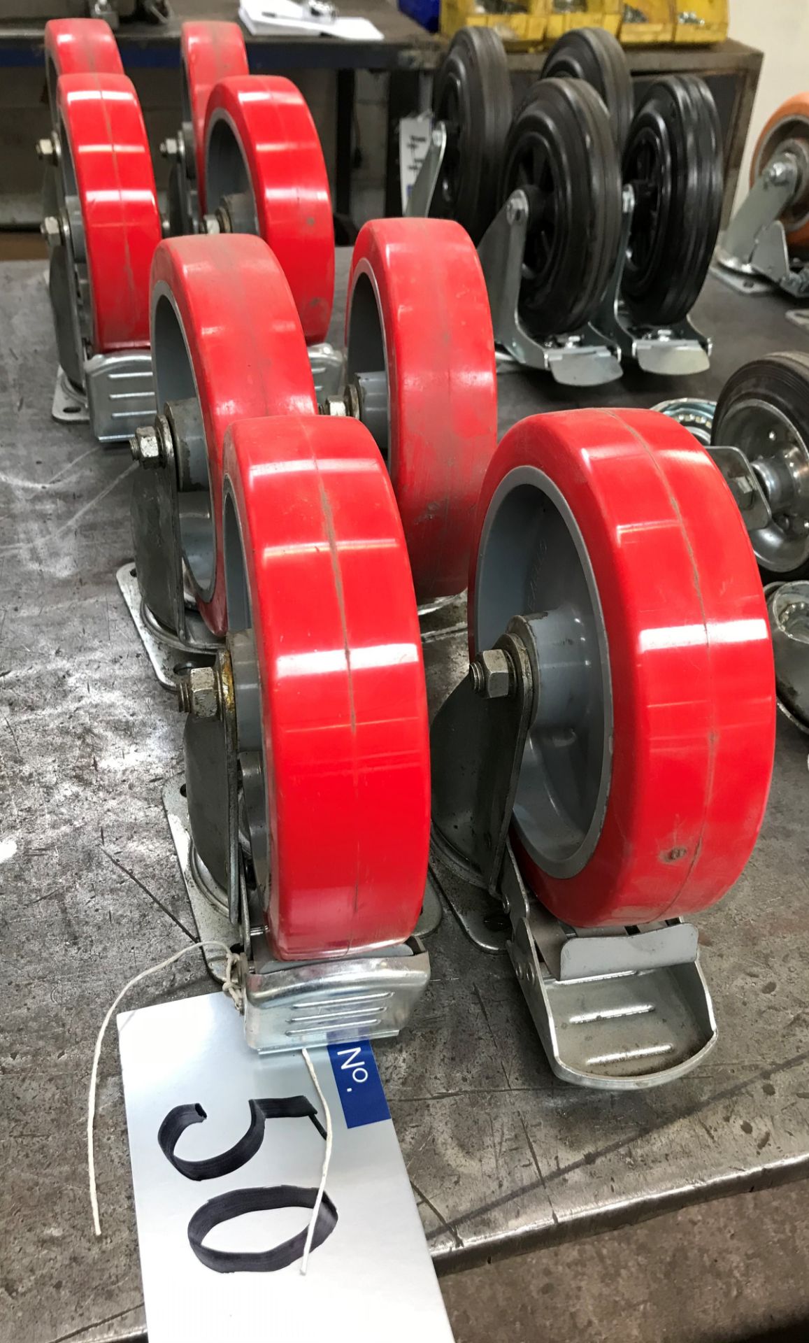 2 Sets of 4 Castors, 8in dia x 1.75in w, 2 braked wheels per set, red.