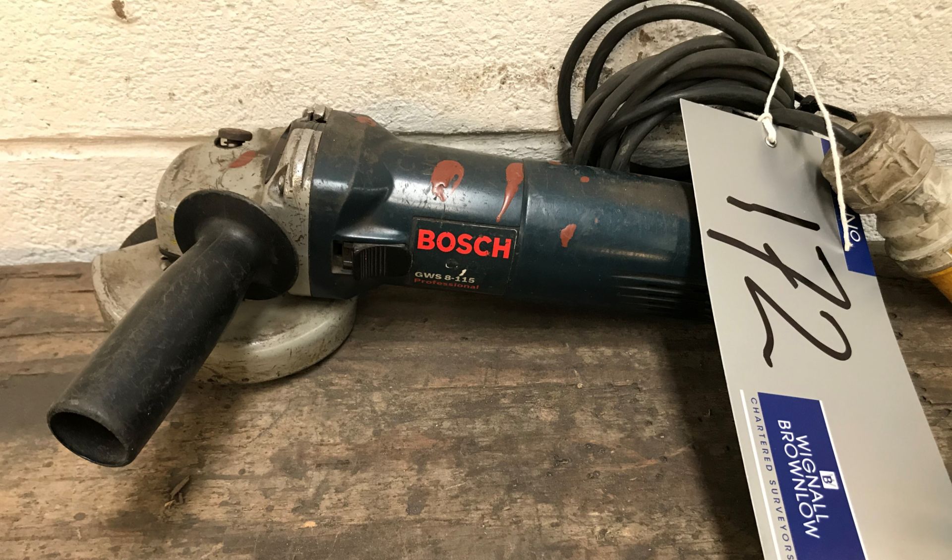 A Bosch Professional GWS8-115 115mm Angle Grinder, 110v.