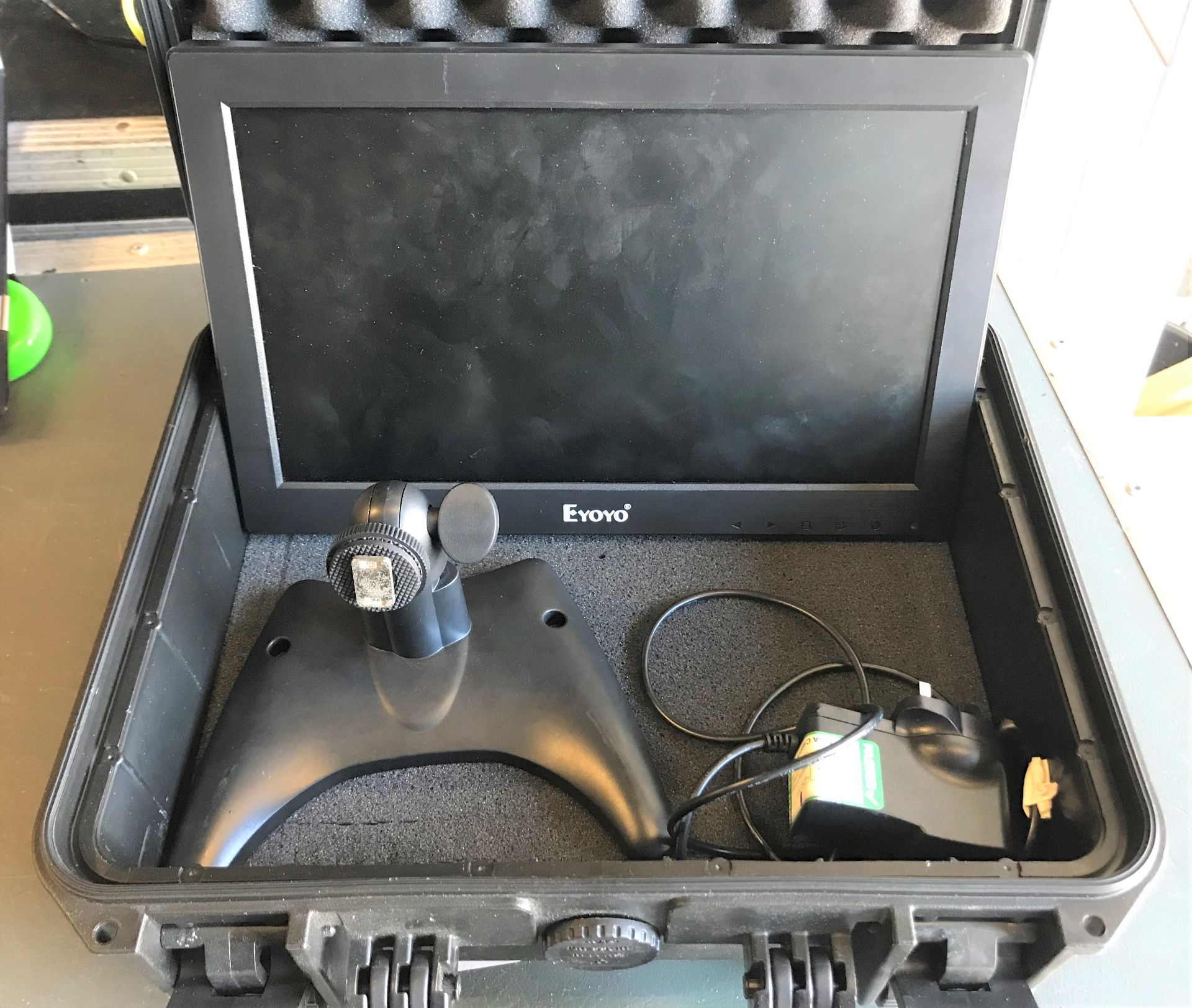 An Eyoyo Model 1116 11.6in LED Monitor with stand, PSU and carry case (located at Unit 2, Dewhurst