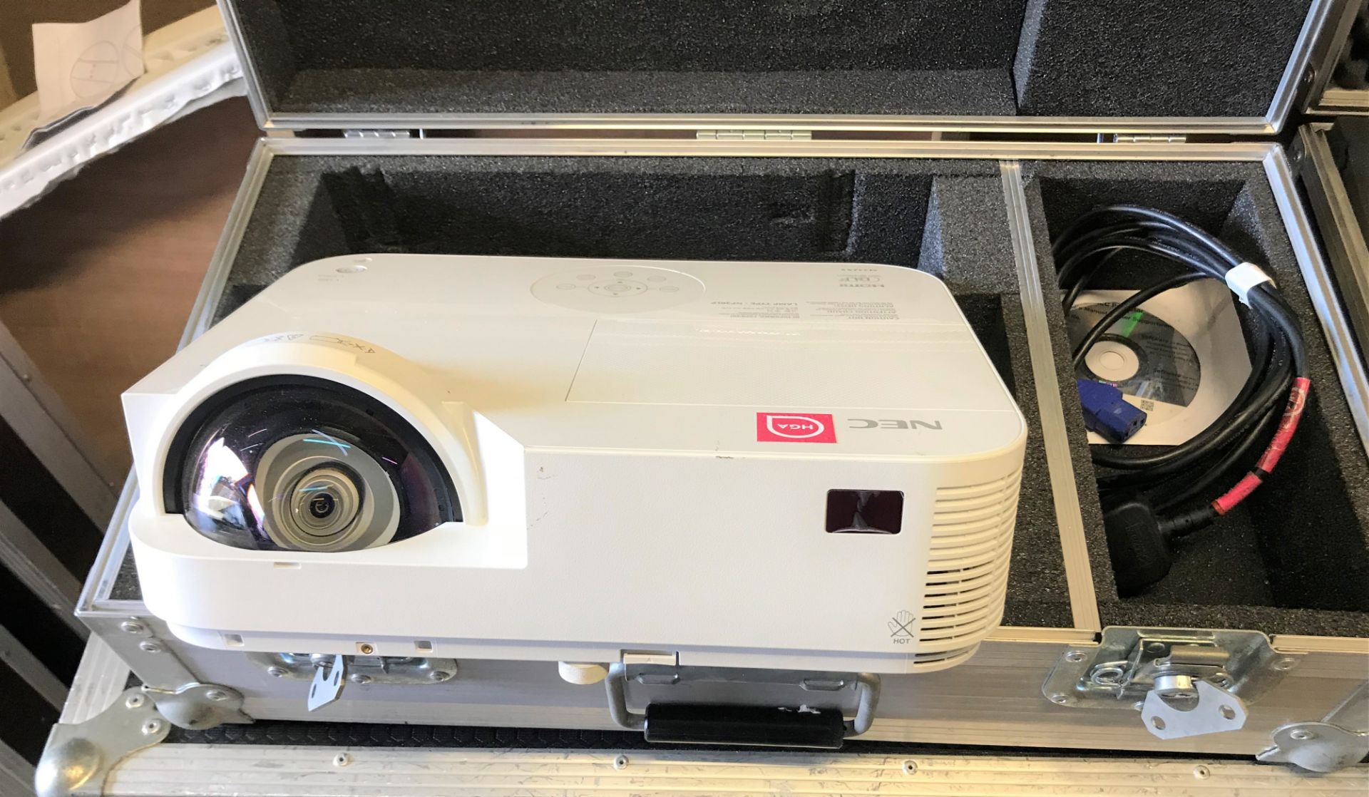 An NEC NP-M332XS DLP Projector with flight case, 620mm x 340mm x 195mm (located at Unit 2,