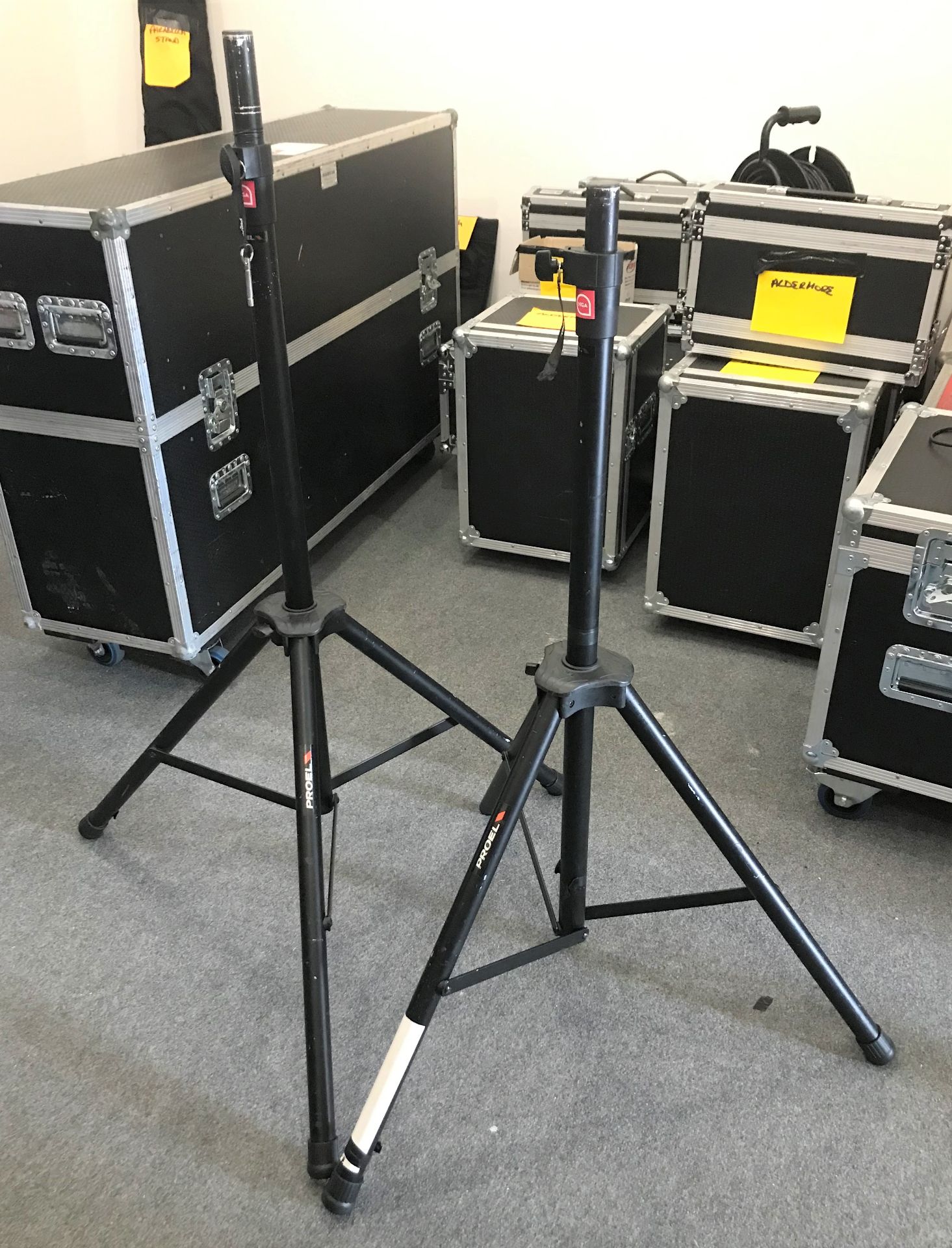 A Pair of Proel Adjustable Height Speaker Stands with carry bag (located at The Old Exchange, 514
