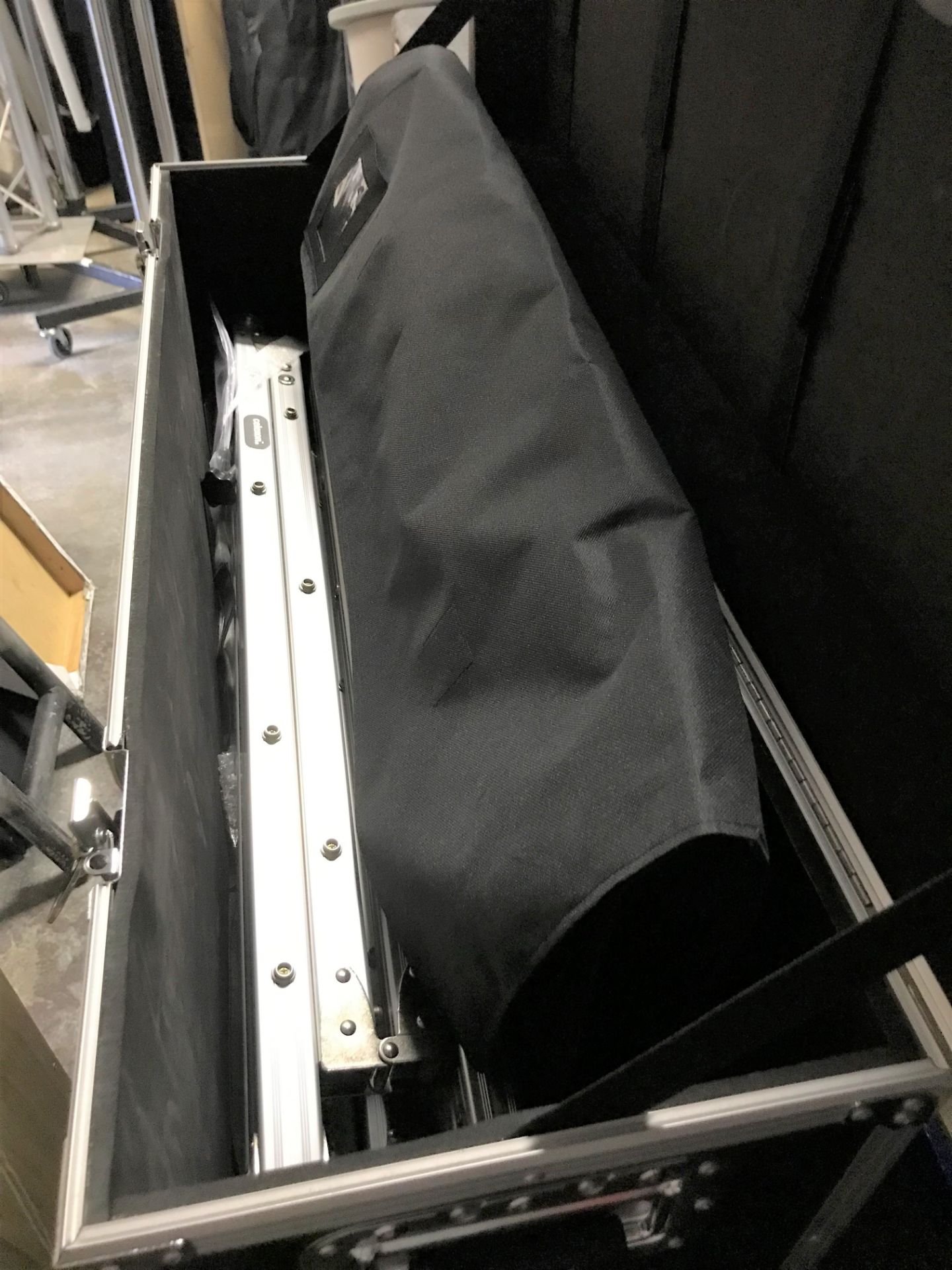 A Celexion 16:9 8ft Projection Screen and flight case, 960mm x 310mm x 410mm (located at Unit 2, - Image 2 of 3