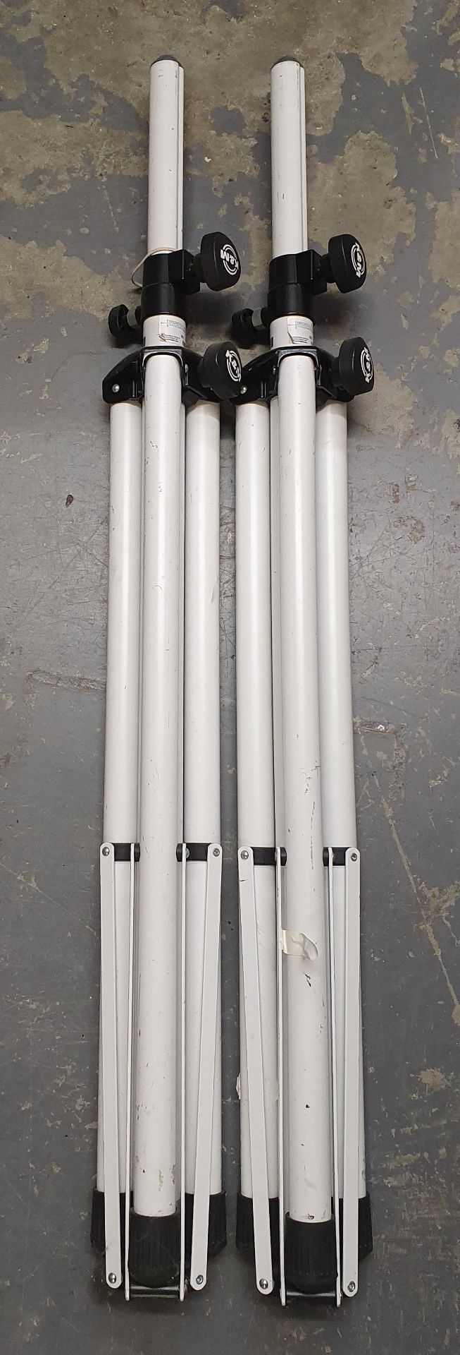 A pair of K+M White Tripod Speaker Stands, no bag