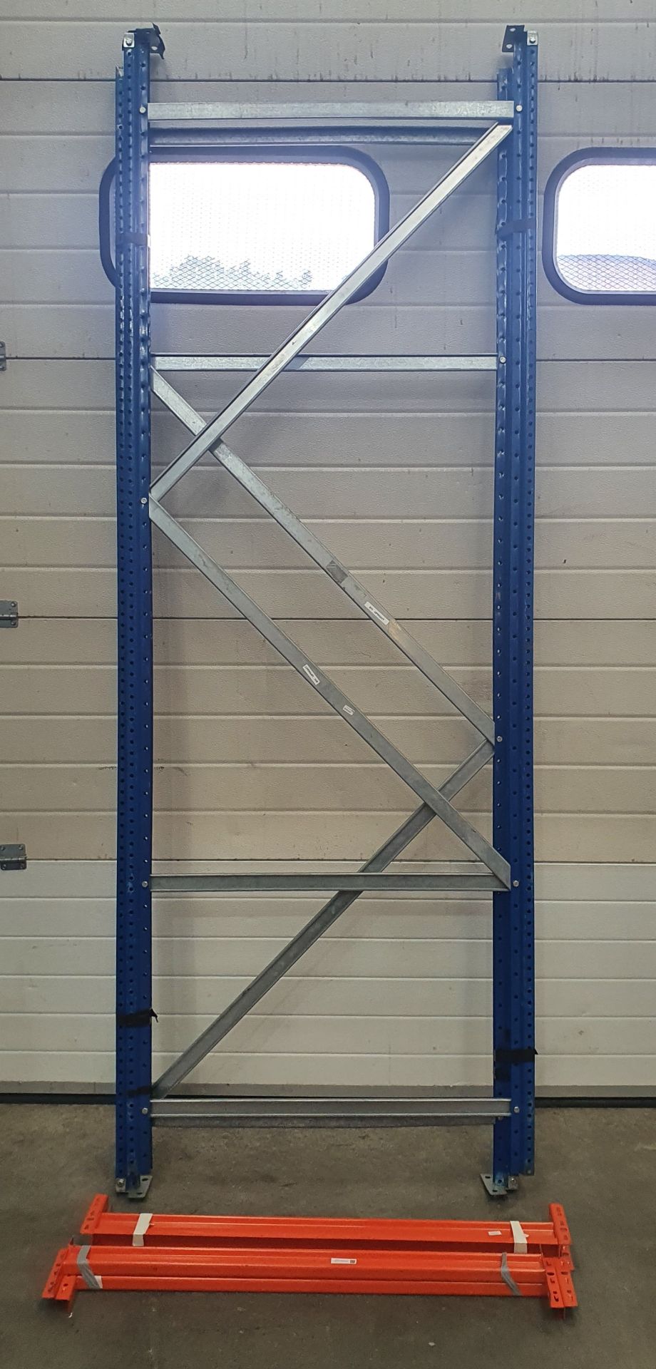 A Boltless Steel Rack with 2 Uprights, 8ft h, 4-1000mm Beams and 2 MDF Shelves (dismantled).