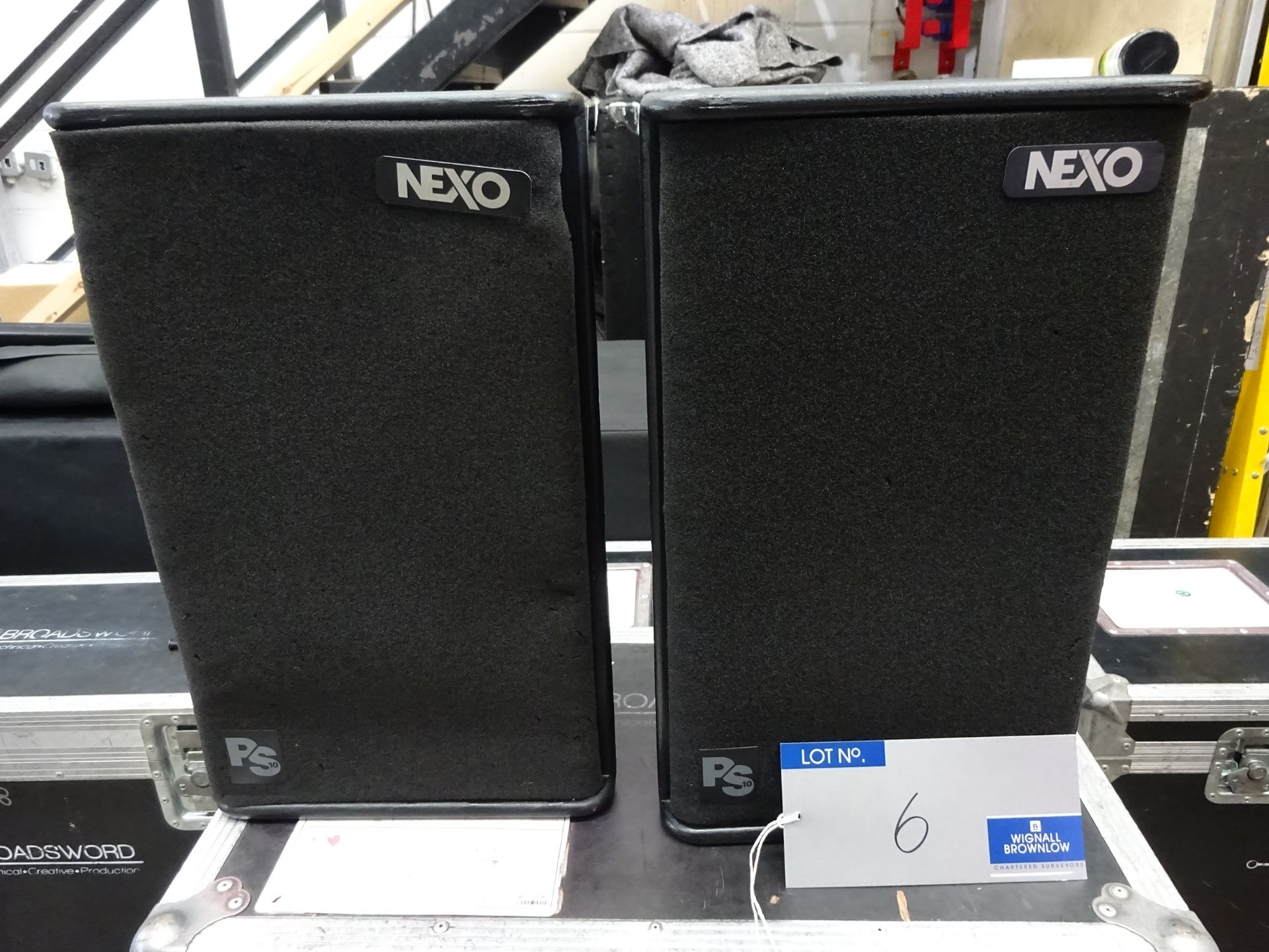 A Pair of Black Nexo PS10 Full Range Loudspeakers with mobile flight case.