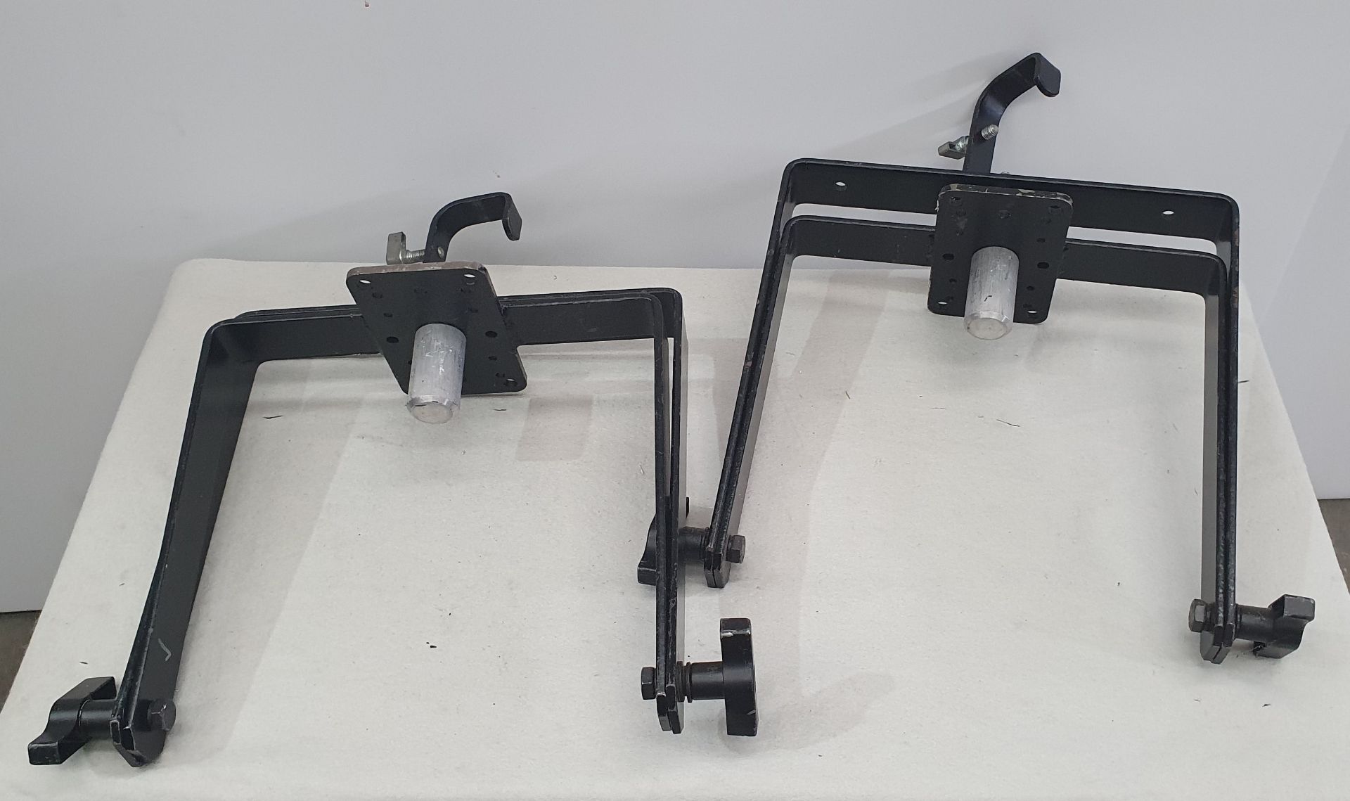 A pair of Nexo PS10 Hanging Brackets.