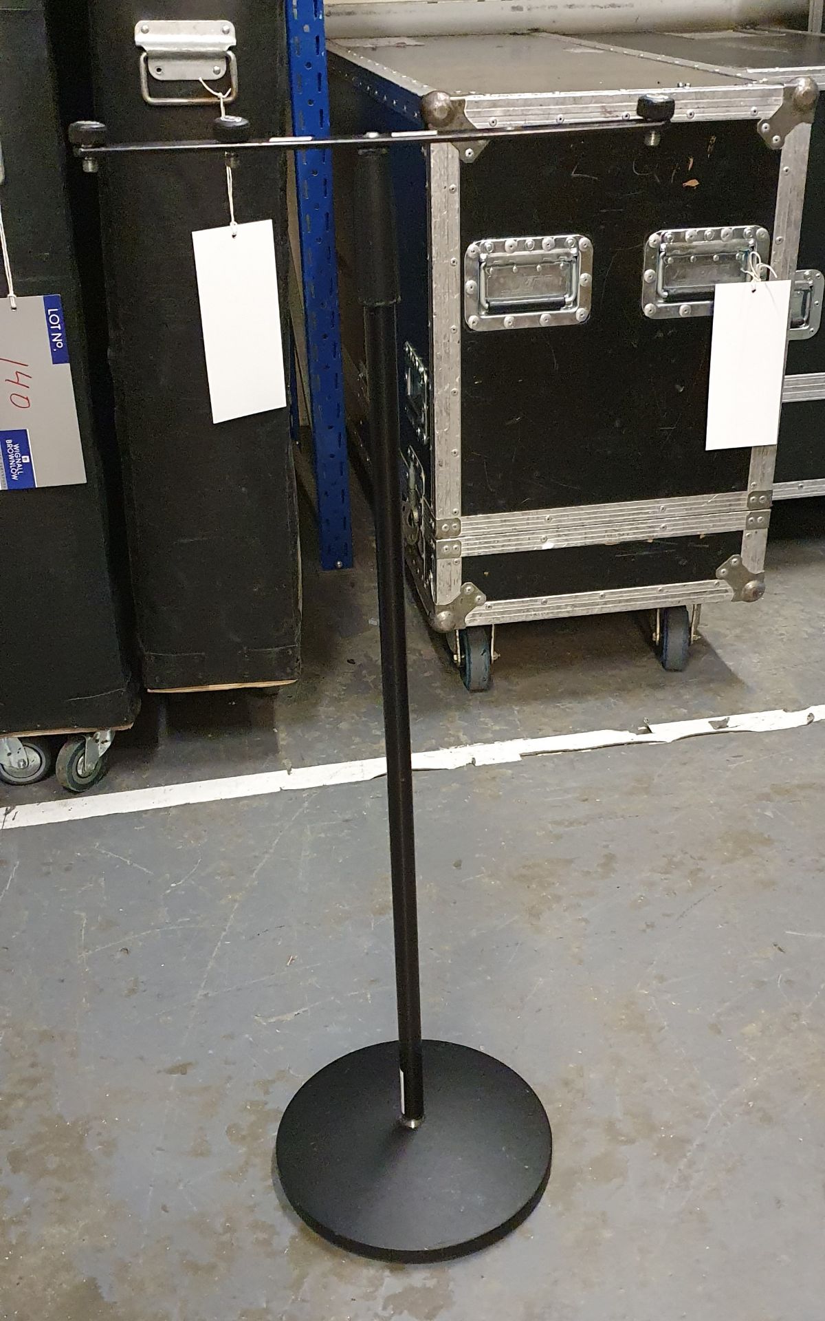 A Black Microphone Stand comprising: base, pole, t-bar with carry bag.