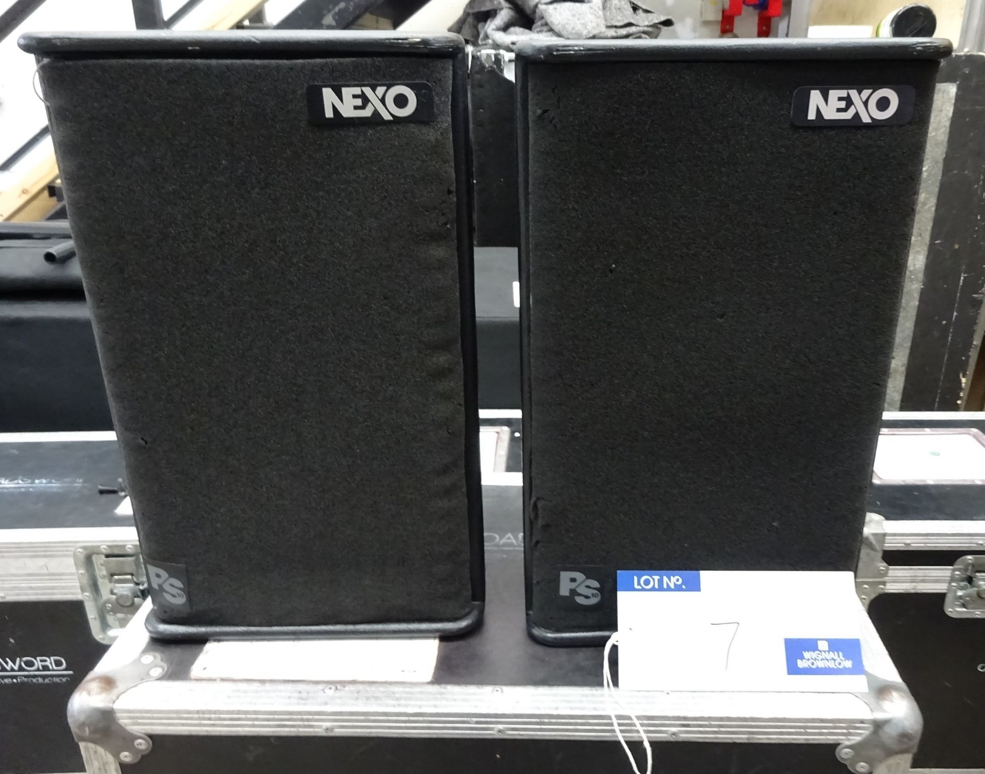 A Pair of Black Nexo PS10 Full Range Loudspeakers with mobile flight case.