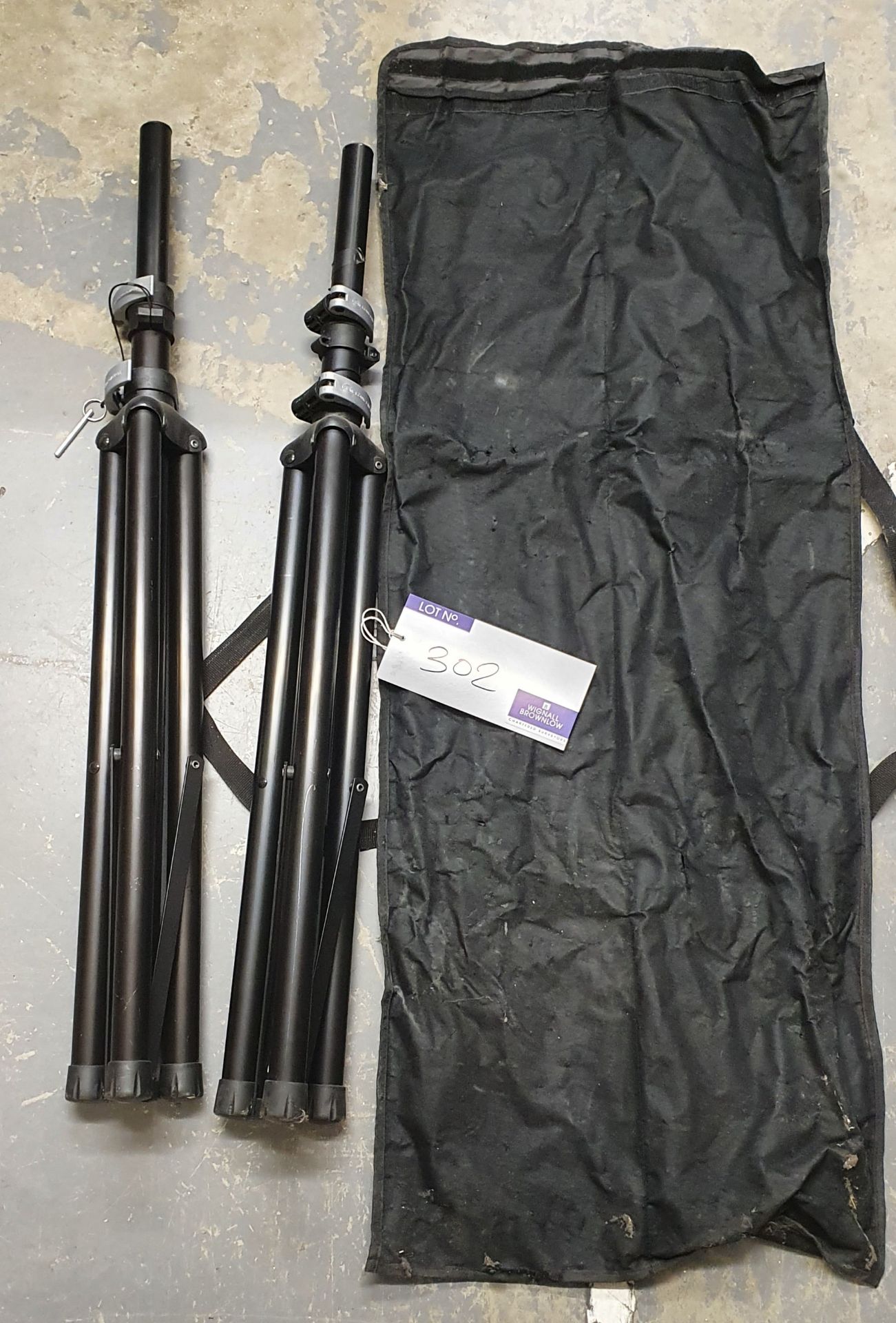 A pair of Black Tripod Speaker Stands with carry bag.