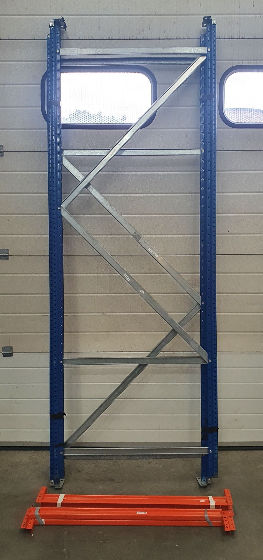 A Boltless Steel Rack with 2 Uprights, 8ft h, 4-1000mm Beams and 2 MDF Shelves (dismantled).