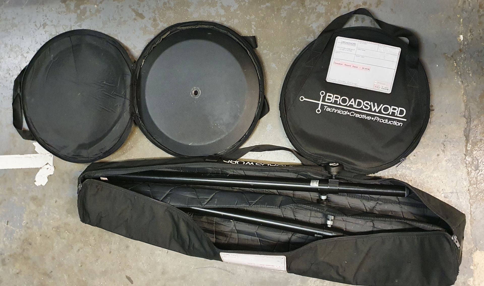 A Pair of K+M Black Speaker Round Base Stands comprising: 2 poles and 2 bases with carry bags. - Image 2 of 2