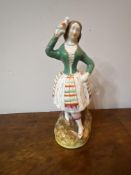 Staffordshire figure of a girl with a parrot