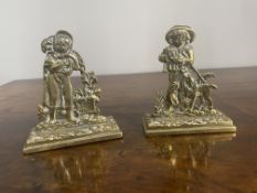 Pair of brass ornaments
