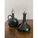 Two Victorian wine bottles with white metal stoppers