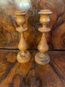 Pair of small olive wood candlesticks