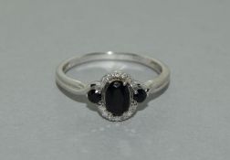 9Ct White Gold Sapphire & Diamond Modernist Ring