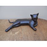 Very unsual lounging bronze cat with a resin finish