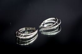 18ct White Gold triple horseshoe shaped earrings, featuring 2.20cts of brilliant-cut diamonds.