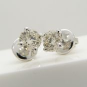 1.02 carat diamond studs in 18ct white gold, boxed.