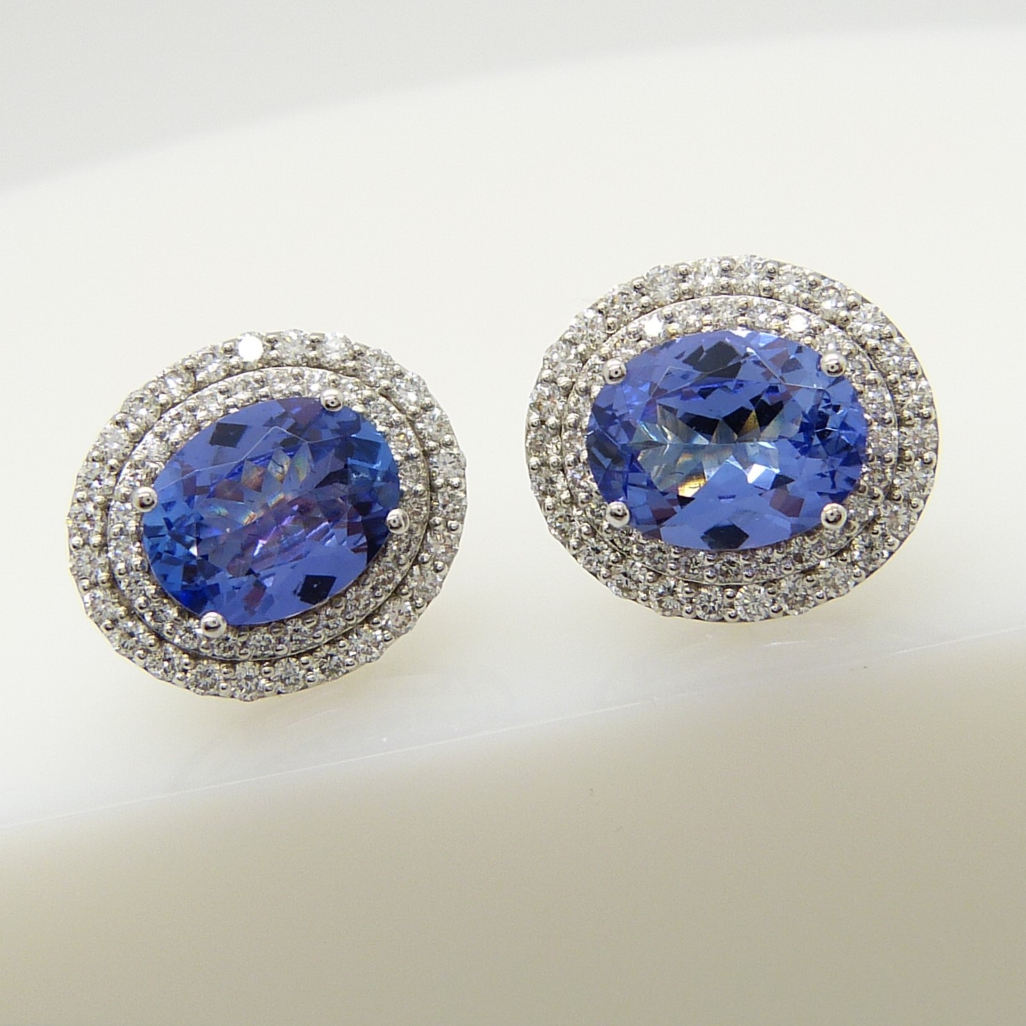 18ct white gold tanzanite and double diamond halo ear studs with screw backs, boxed. - Image 2 of 6