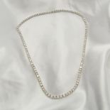 Stunning 18ct white gold graduated diamond "Riviere" necklace, boxed. Diamonds: 18.05 carats.