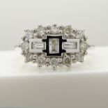 18ct white gold 0.50 carat diamond "boat" cluster ring.